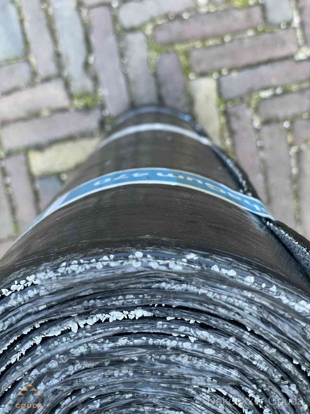 Rol bitumen dakleer met leislag voor plat dak in Gouda